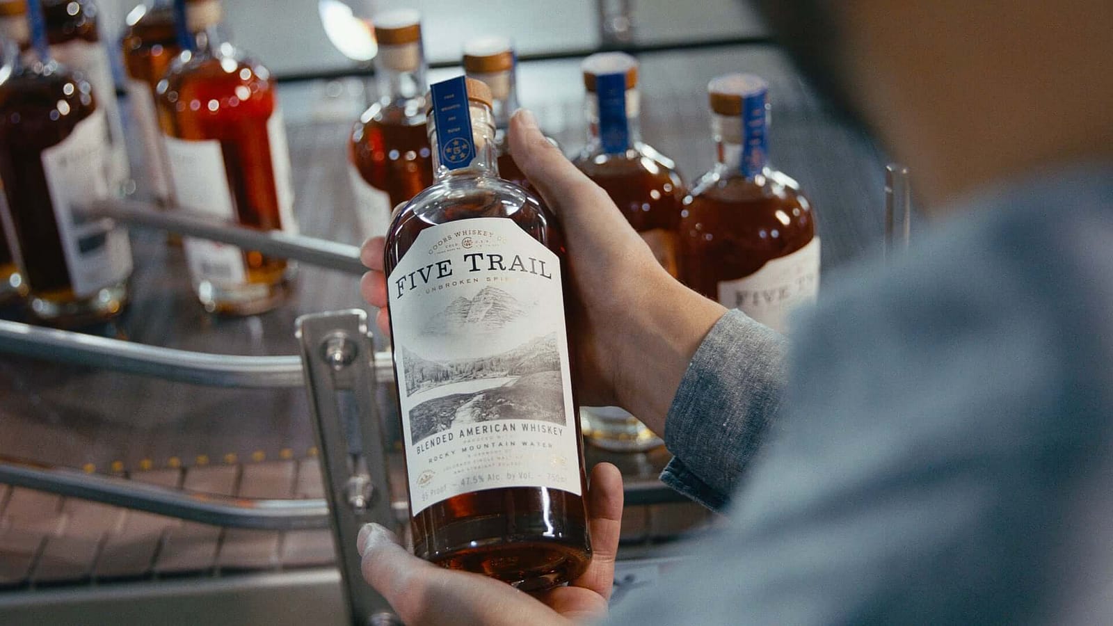 Five Trail Bottle coming off bottling line