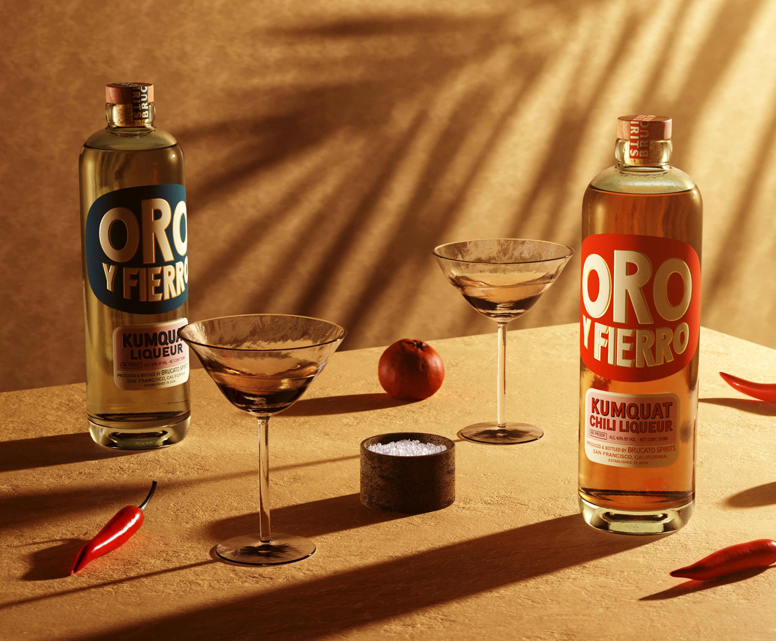 Oro Y Fierro kumquat liqueur branding and packaging design with tinted green glass