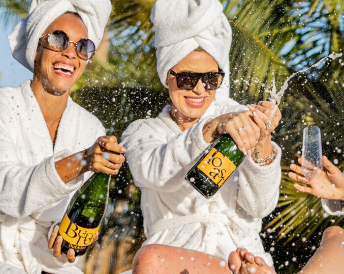 JaM girls in towels spraying bubbles