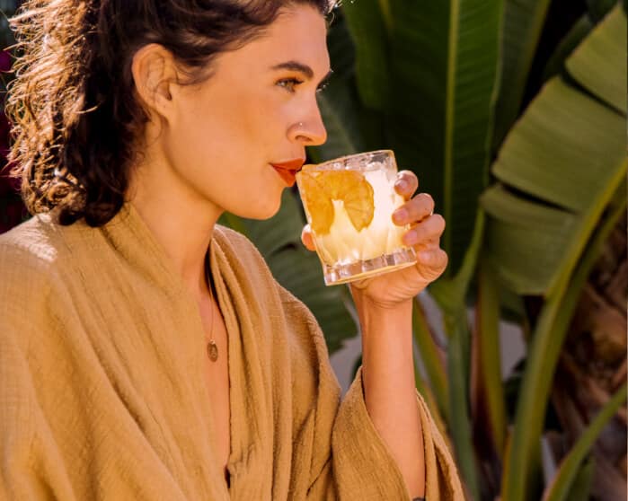 Los Arango Tequila woman drinking margarita cocktail