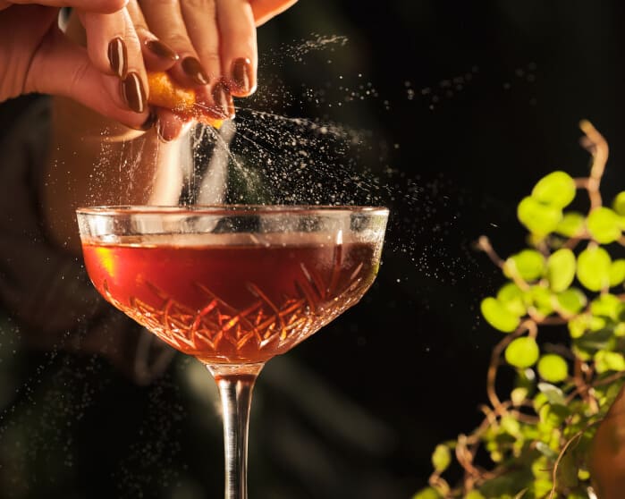 zaya rum cocktail orange peel expression