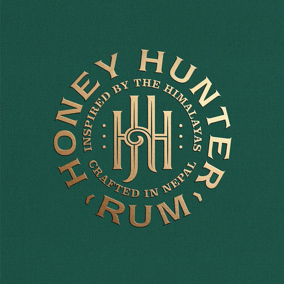Honey Hunter Rum packaging design featuring embossed label and gold foil details