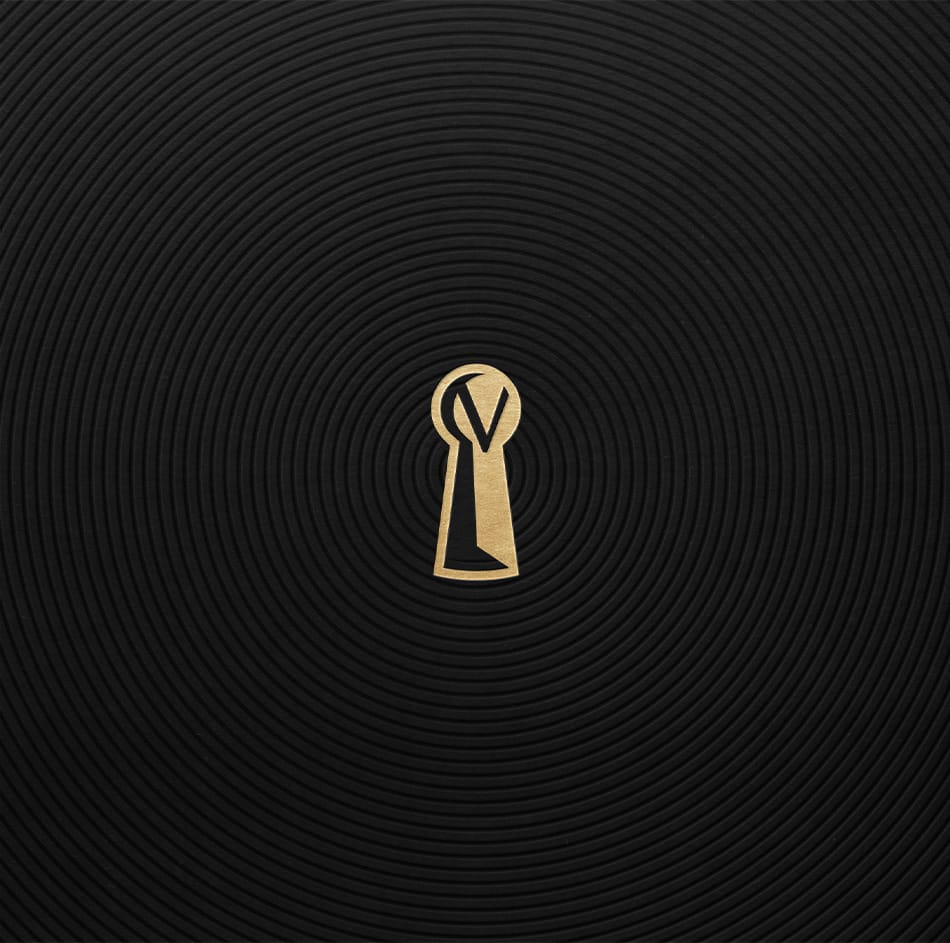 Premium wine packaging design featuring sculpted textures and gold foil keyhole motif